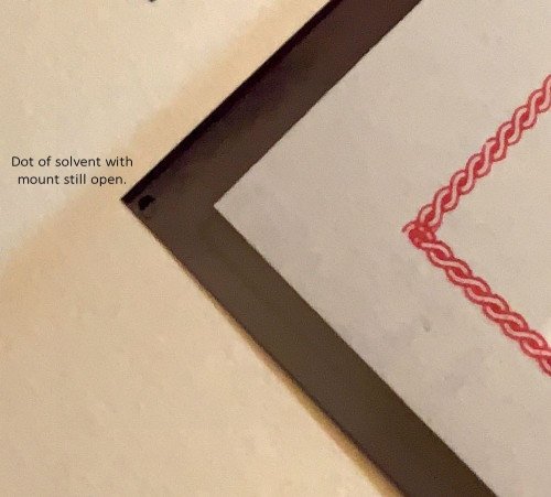 Drop of solvent with the mount still open.